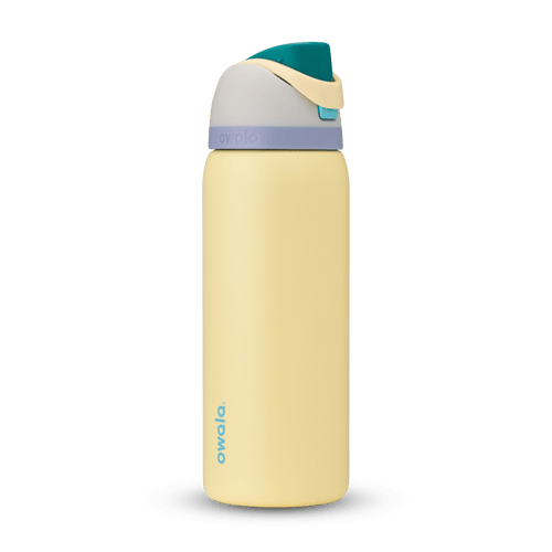 FreeSip 32oz in Sunny Daze, soft yellow body with teal flip cap, cream carry loop, gray lid, and lavender accent band
