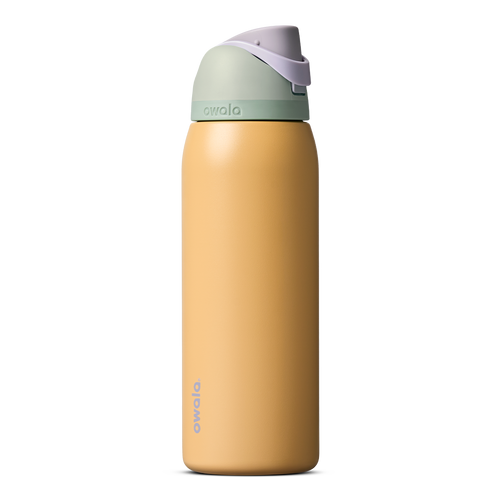 FreeSip 40oz in Beachfront, warm golden yellow insulated bottle with mint green accent band, lavender flip cap, and lavender carry loop