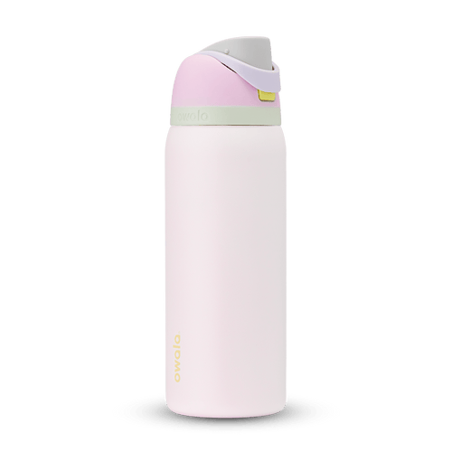 FreeSip 32oz in Candy Coated; soft pink body with pink flip cap, lavender carry loop, sage green accent band on the lid, and yellow push-button